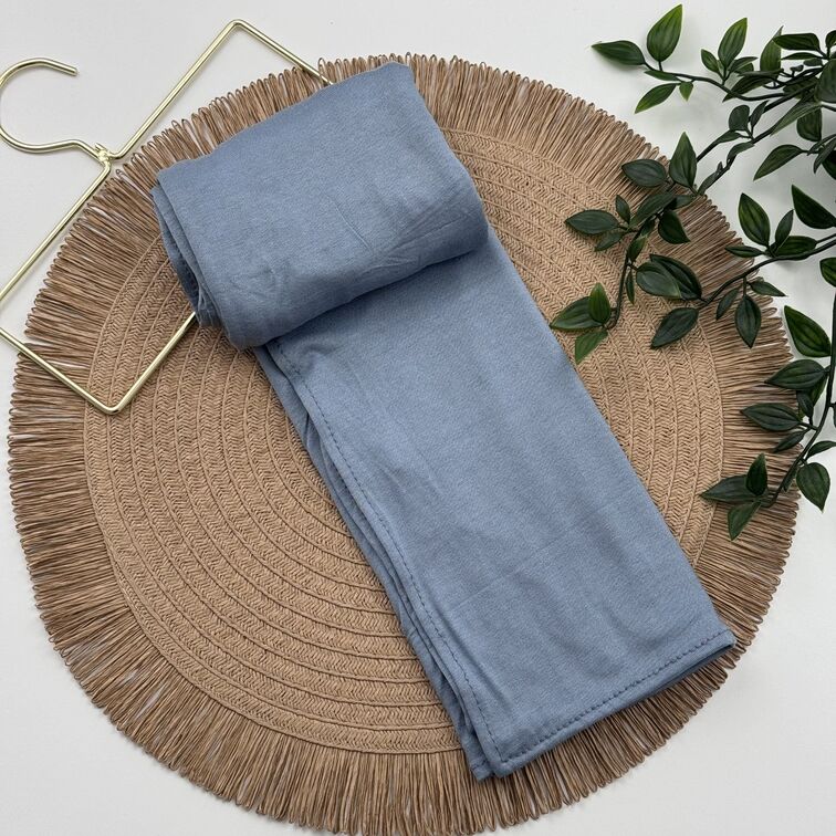 Jersey Hijab in Light Steel Blue, soft and breathable with a thick, flexible design, providing secure coverage and easy styling for active, everyday wear.