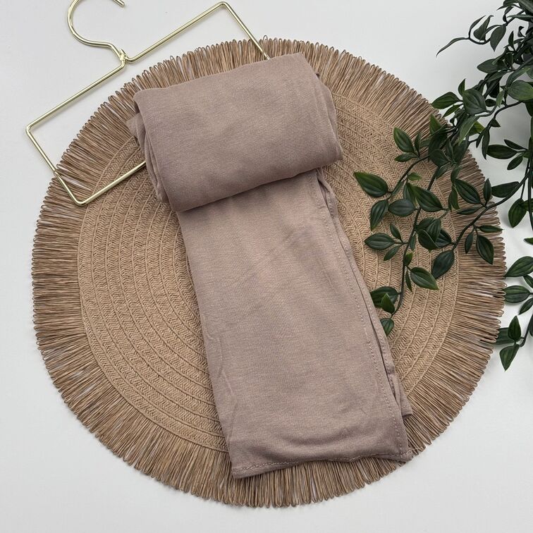 Jersey Hijab in Caramel, soft and breathable with a thick, flexible design, providing secure coverage and easy styling for active, everyday wear.
