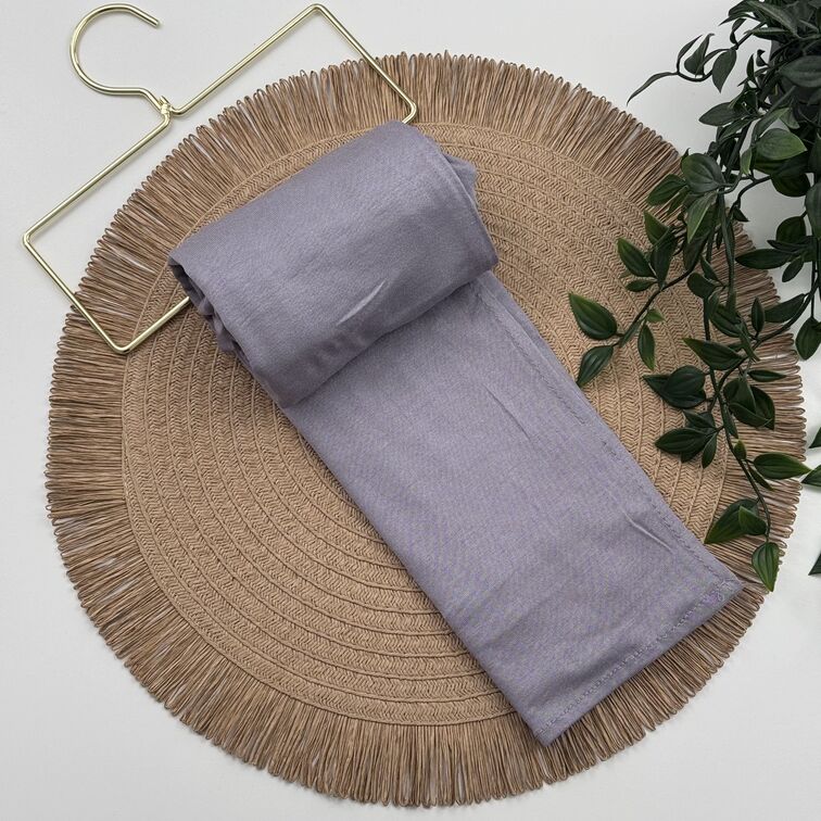 Jersey Hijab in Lavender, soft and breathable with a thick, flexible design, providing secure coverage and easy styling for active, everyday wear.