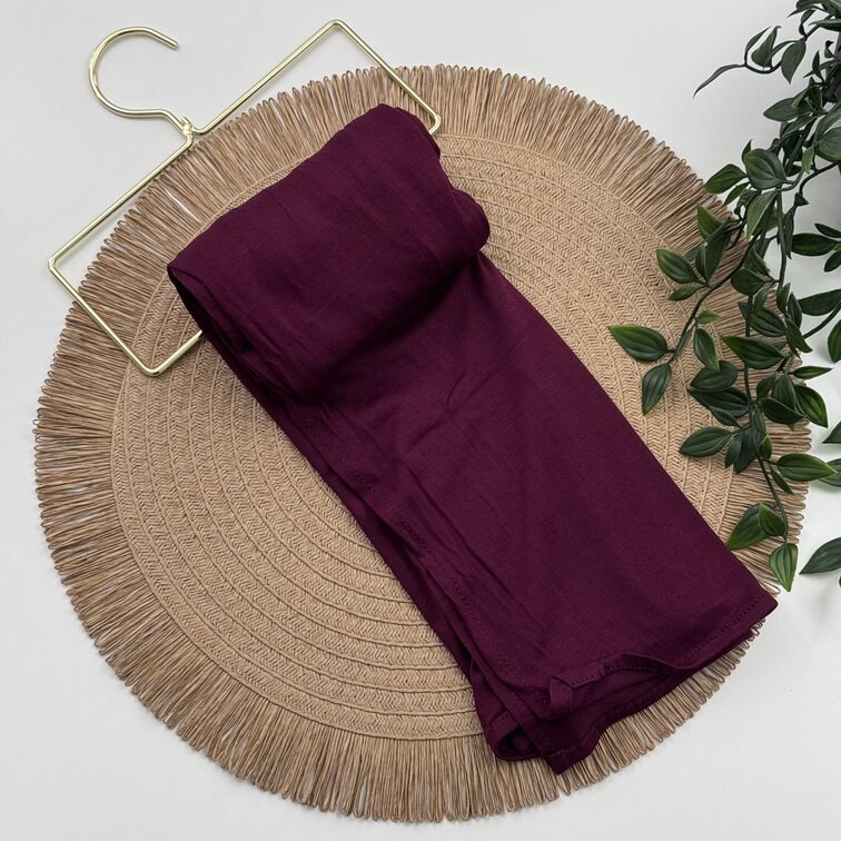 Jersey Hijab in Maroon, soft and breathable with a thick, flexible design, providing secure coverage and easy styling for active, everyday wear.