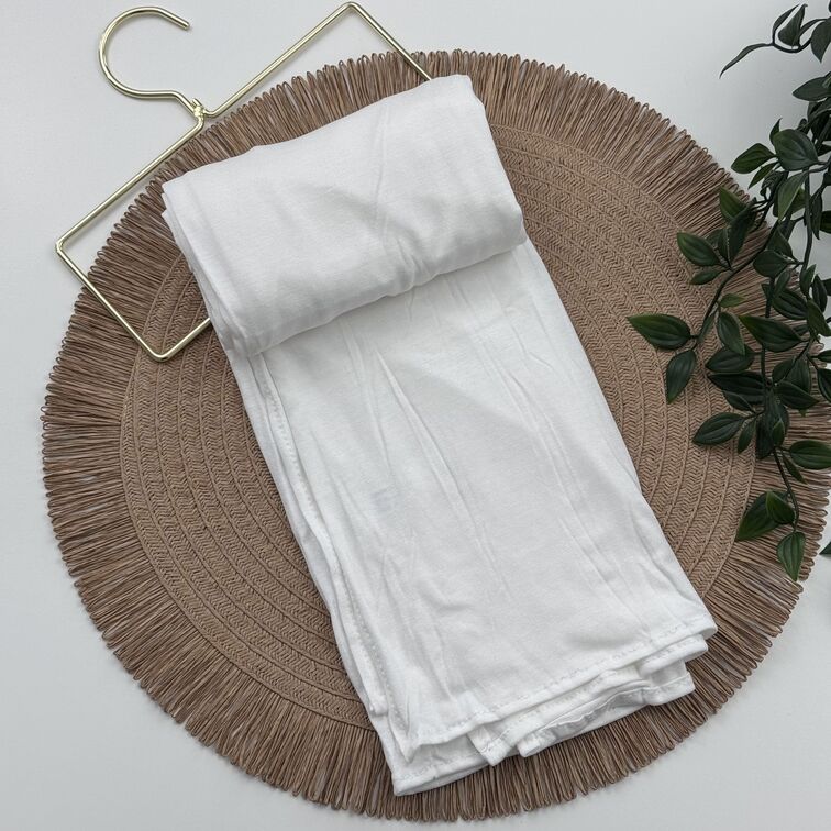 Jersey Hijab in Off White, soft and breathable with a thick, flexible design, providing secure coverage and easy styling for active, everyday wear.