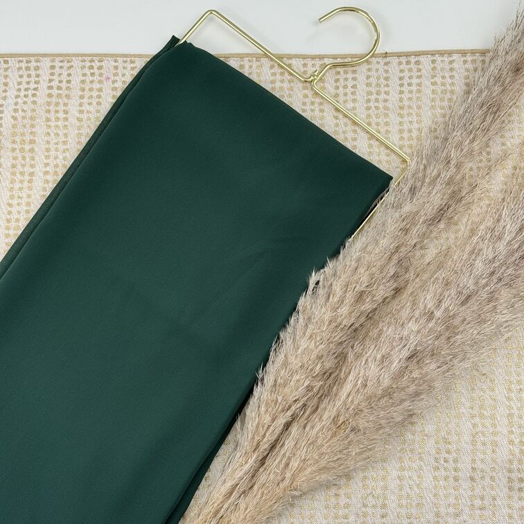 Chiffon Hijab in Dark Green, lightweight and smooth with a soft drape, offering breathable comfort and versatile styling for everyday wear.