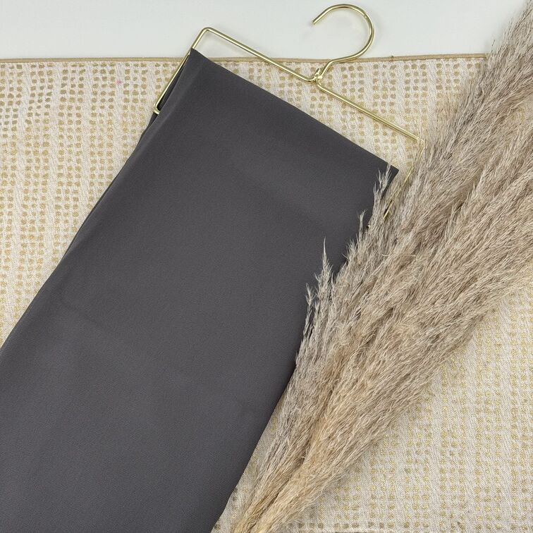 Chiffon Hijab in Dark Grey, lightweight and smooth with a soft drape, offering breathable comfort and versatile styling for everyday wear.