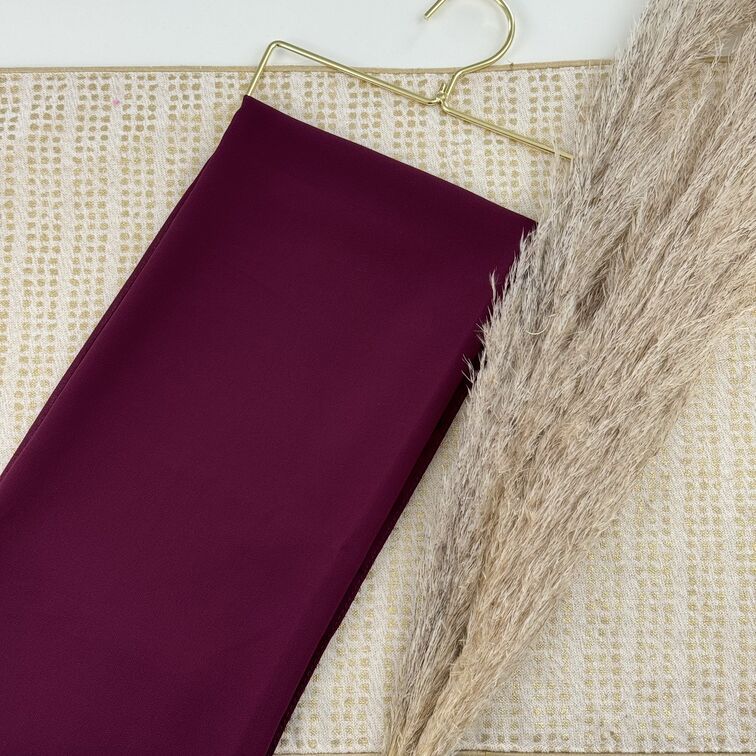 Chiffon Hijab in Maroon, lightweight and smooth with a soft drape, offering breathable comfort and versatile styling for everyday wear.