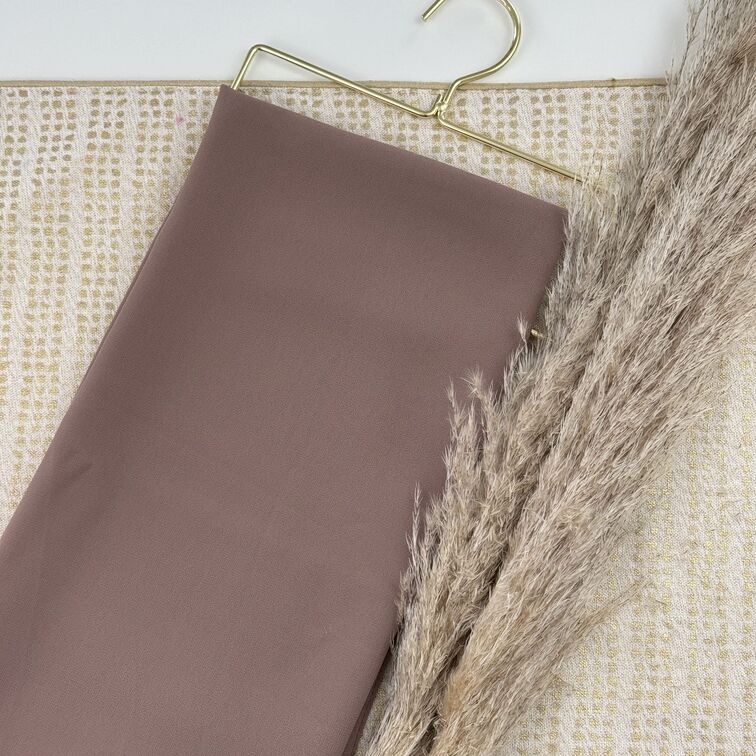 Chiffon Hijab in Rose Brown, lightweight and smooth with a soft drape, offering breathable comfort and versatile styling for everyday wear.