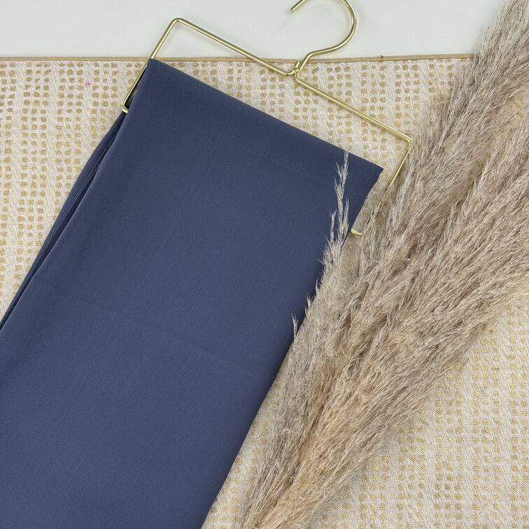 Chiffon Hijab in Slate Grey, lightweight and smooth with a soft drape, offering breathable comfort and versatile styling for everyday wear.