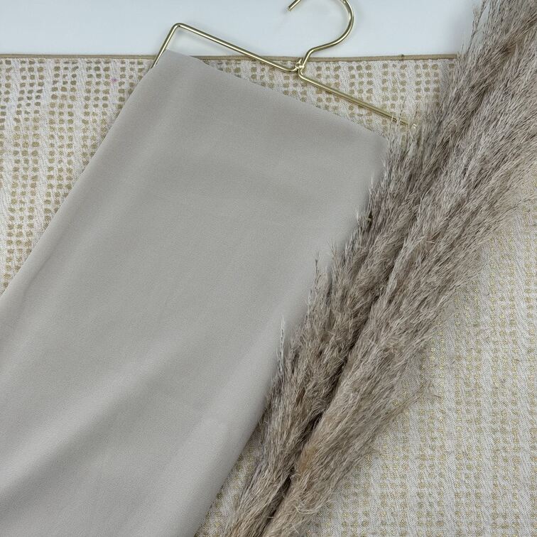 Chiffon Hijab in Floral White, lightweight and smooth with a soft drape, offering breathable comfort and versatile styling for everyday wear.