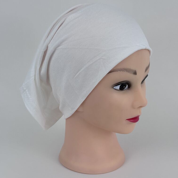 Soft and breathable cotton hijab cap with a stretchable fit and a knitted floral design at the back for added elegance.