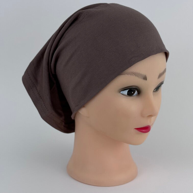 Soft and breathable cotton hijab cap with a stretchable fit and a knitted floral design at the back for added elegance.