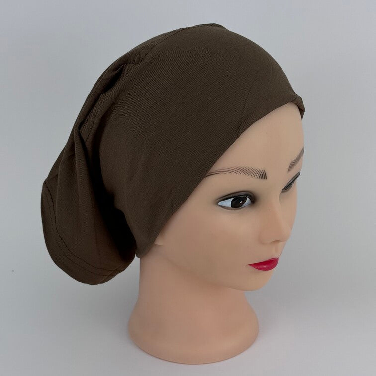 Soft and breathable cotton hijab cap with a stretchable fit and a knitted floral design at the back for added elegance.