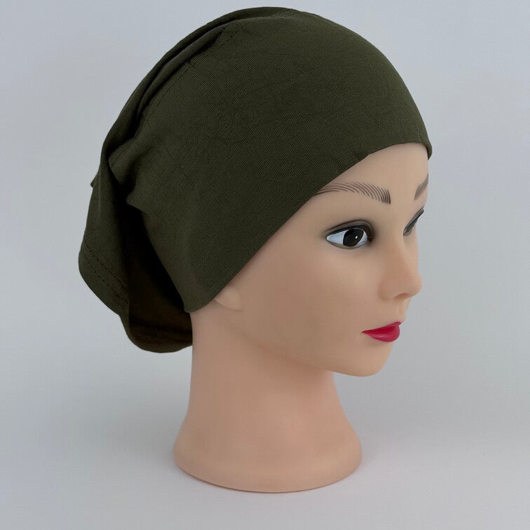 Soft and breathable cotton hijab cap with a stretchable fit and a knitted floral design at the back for added elegance.