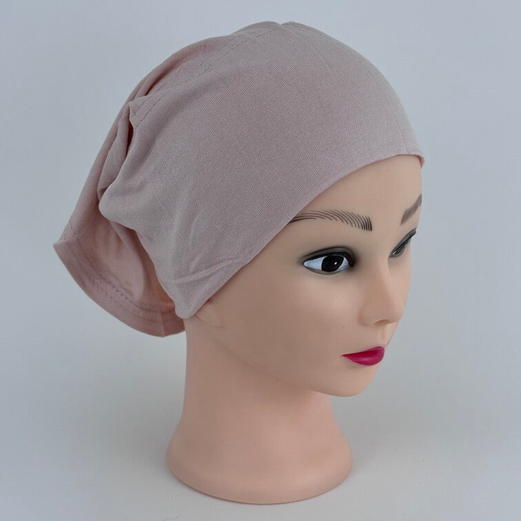 Soft and breathable cotton hijab cap with a stretchable fit and a knitted floral design at the back for added elegance.