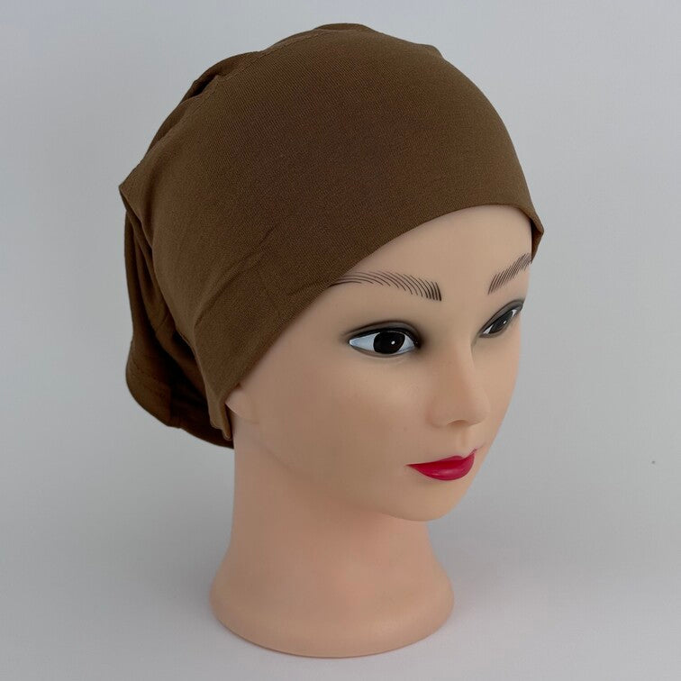 Soft and breathable cotton hijab cap with a stretchable fit and a knitted floral design at the back for added elegance.