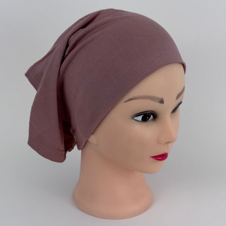 Soft and breathable cotton hijab cap with a stretchable fit and a knitted floral design at the back for added elegance.