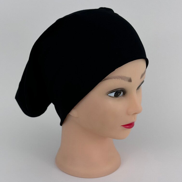 Soft and breathable cotton hijab cap with a stretchable fit and a knitted floral design at the back for added elegance.