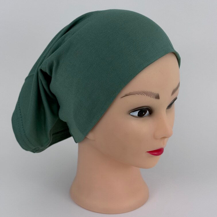 Soft and breathable cotton hijab cap with a stretchable fit and a knitted floral design at the back for added elegance.