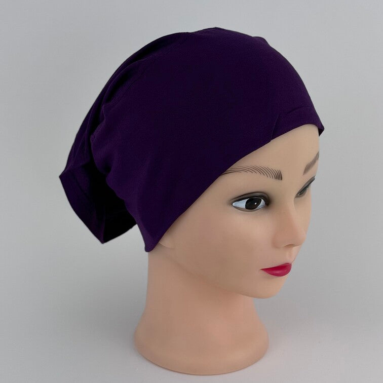 Soft and breathable cotton hijab cap with a stretchable fit and a knitted floral design at the back for added elegance.