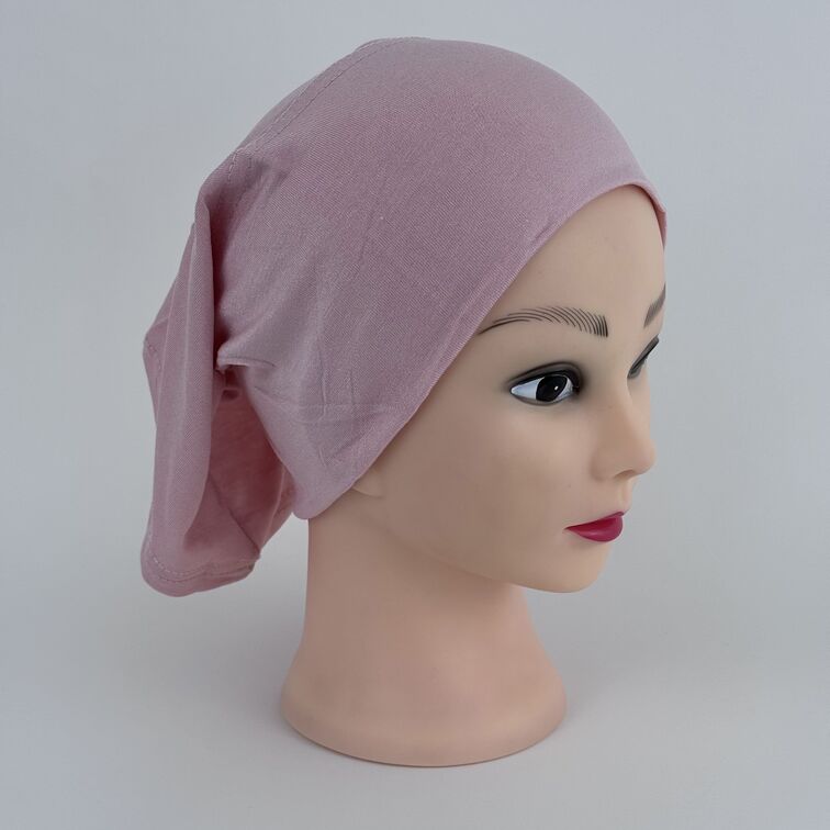 Soft and breathable cotton hijab cap with a stretchable fit and a knitted floral design at the back for added elegance.