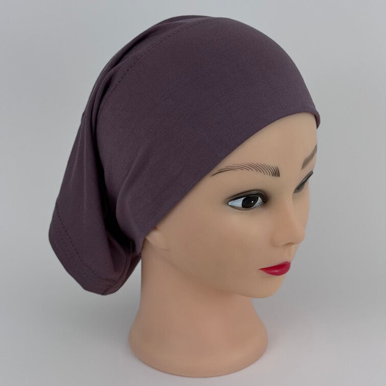 Soft and breathable cotton hijab cap with a stretchable fit and a knitted floral design at the back for added elegance.