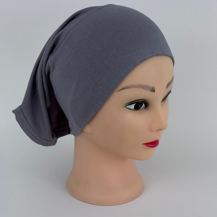 Soft and breathable cotton hijab cap with a stretchable fit and a knitted floral design at the back for added elegance.