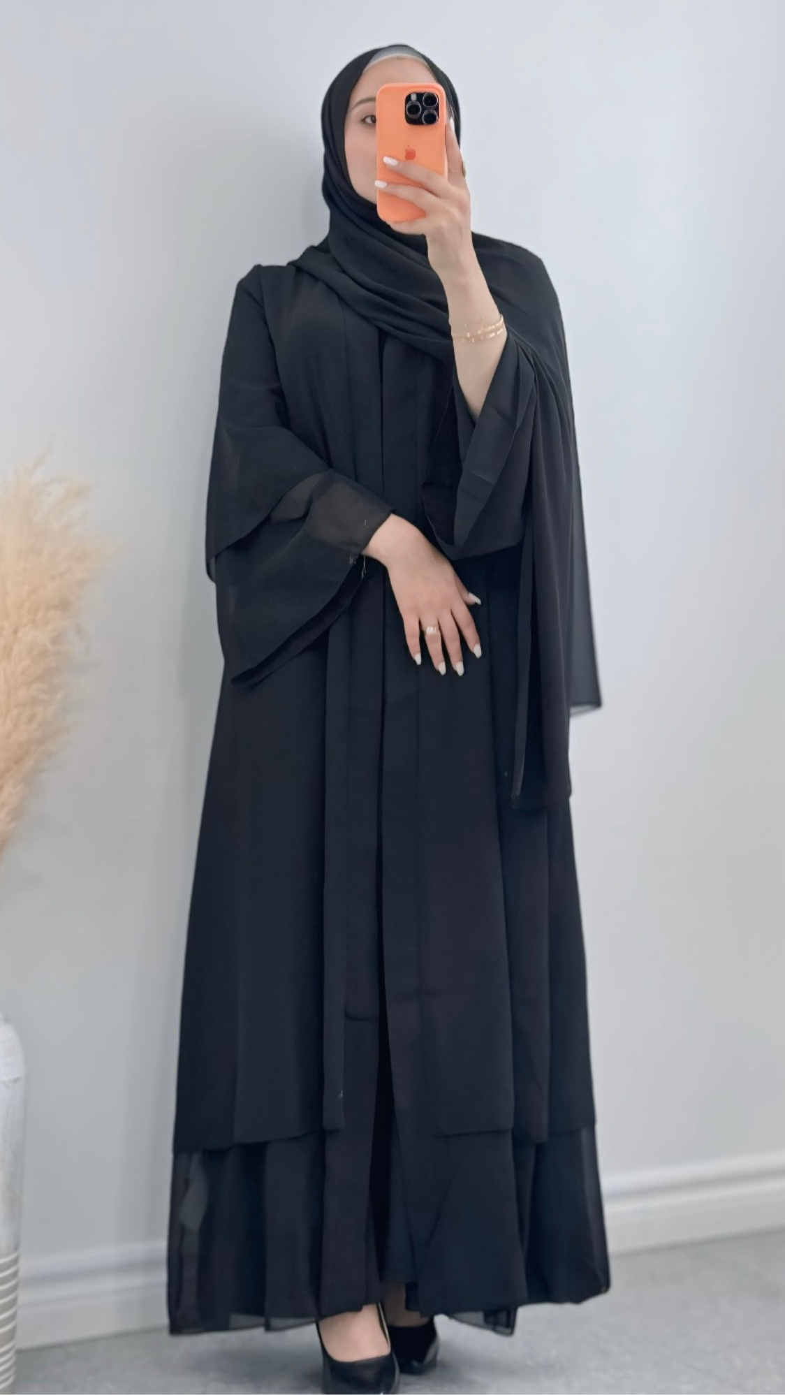 Black Chiffon Layered Abaya, lightweight and breathable with a soft, seamless front-open design, blending comfort, modesty, and style
