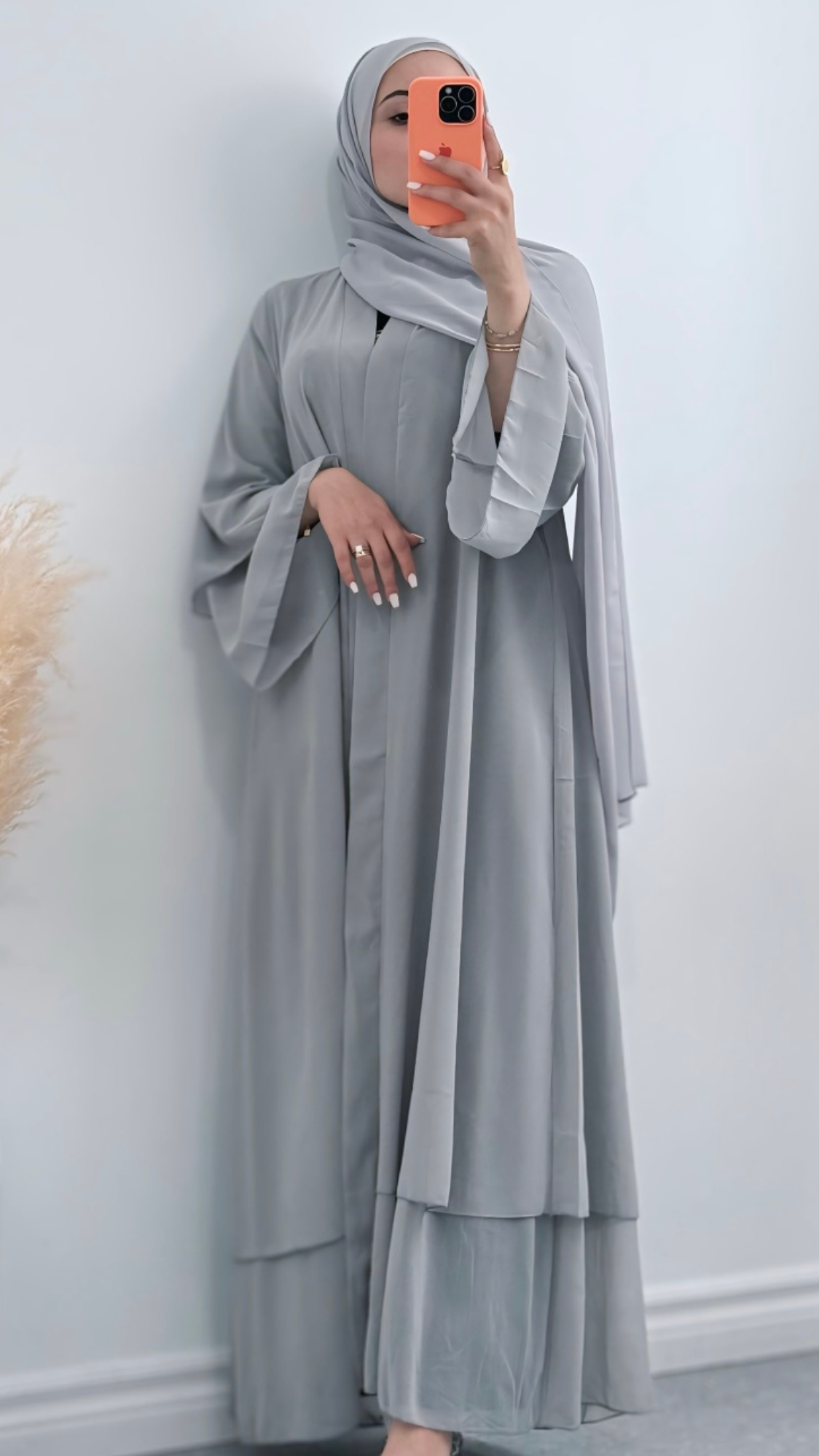 Grey Chiffon Layered Abaya, lightweight and breathable with a soft, seamless front-open design, blending comfort, modesty, and style