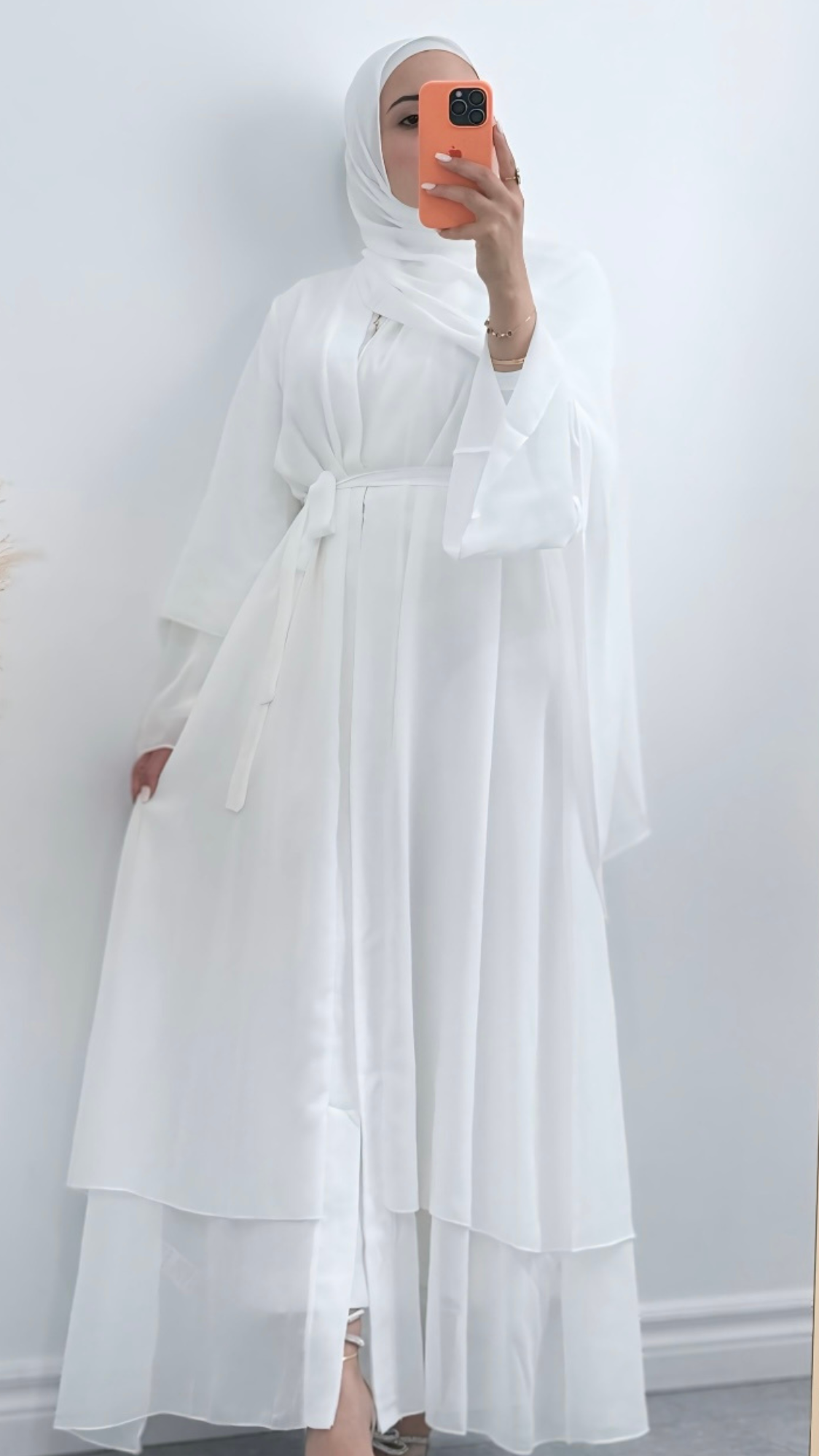White Chiffon Layered Abaya, lightweight and breathable with a soft, seamless front-open design, blending comfort, modesty, and style